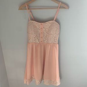 Pink lace dress with buttons